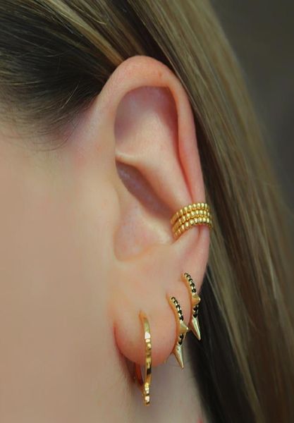 gold plated 925 sterling silver mini hoop with three spikes paved black cz minimal small hoop earring for women3504110, Golden;silver
gold plated 925 sterling silver mini hoop with three spikes paved black cz minimal small hoop earring for women3504110, Golden;silver