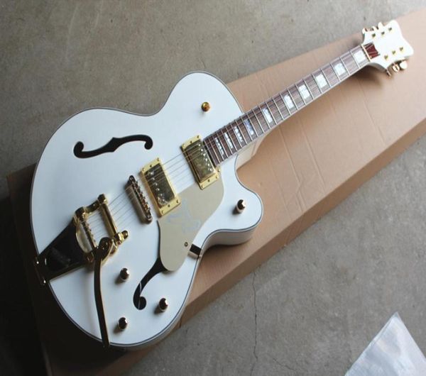 factory custom semihollow white body electric guitar with golden hardwarebig tremolo bridgecan be customized4443705
factory custom semihollow white body electric guitar with golden hardwarebig tremolo bridgecan be customized4443705