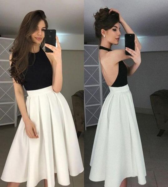 stylish black white homecoming dresses halter neck open backless knee length party dresses custom made aline short prom dres6568872
stylish black white homecoming dresses halter neck open backless knee length party dresses custom made aline short prom dres6568872