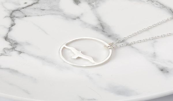 5pcs abstract flying bird pendant necklace eagle swallow seagull in circle charm jewelry necklace for gift3346650, Silver
5pcs abstract flying bird pendant necklace eagle swallow seagull in circle charm jewelry necklace for gift3346650, Silver
