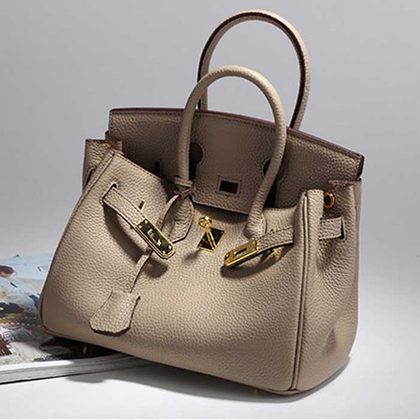 fashion h ermess bags star style lychee grain full leather bag with cowhide layer for women's portable large bag one genuine leather ba
fashion h ermess bags star style lychee grain full leather bag with cowhide layer for women's portable large bag one genuine leather ba