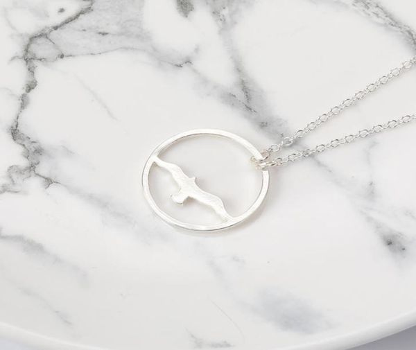 5pcs abstract flying bird pendant necklace eagle swallow seagull in circle charm jewelry necklace for gift4210752, Silver
5pcs abstract flying bird pendant necklace eagle swallow seagull in circle charm jewelry necklace for gift4210752, Silver