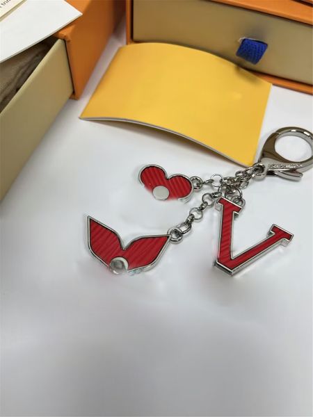 designer brand keychains fashion bag car key chain flower design accessories men women keychain decoration bags pendant, Silver
designer brand keychains fashion bag car key chain flower design accessories men women keychain decoration bags pendant, Silver