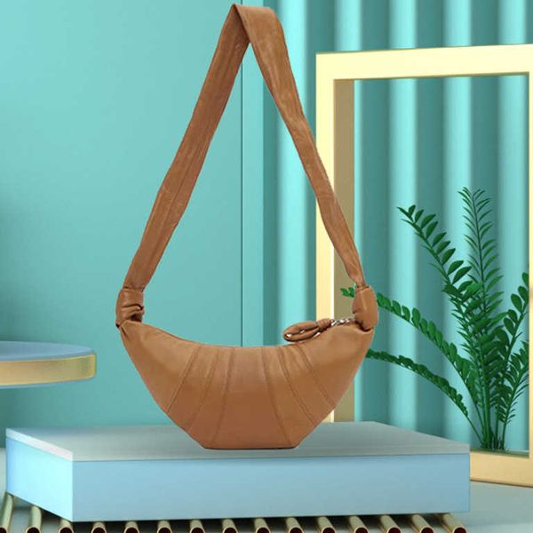 2022 new small crowd can sing cow horn bag, leather armpit wide band chest bag, dumpling bag, one shoulder cross body french stick women
2022 new small crowd can sing cow horn bag, leather armpit wide band chest bag, dumpling bag, one shoulder cross body french stick women