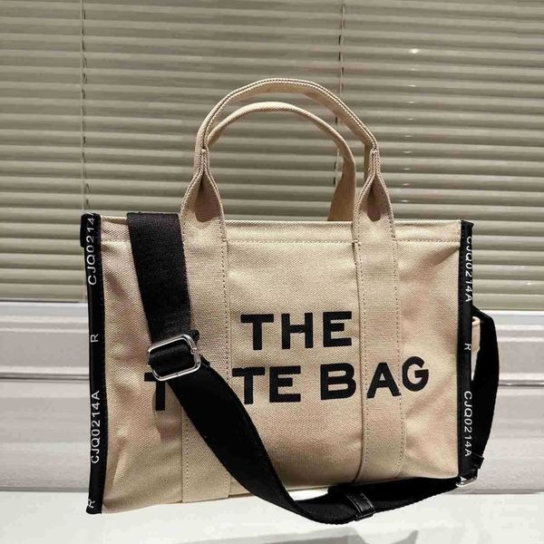 new canvas designers handbag marc tote bag casual totes women designer bag luxury shoulder bags fashion allmatch shopper bags wallet 33cm
new canvas designers handbag marc tote bag casual totes women designer bag luxury shoulder bags fashion allmatch shopper bags wallet 33cm