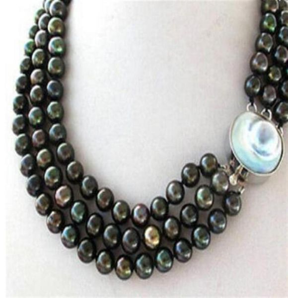 3 strands black peacock round pearl necklace mabe blister pearl clasp28713727001, Silver
3 strands black peacock round pearl necklace mabe blister pearl clasp28713727001, Silver