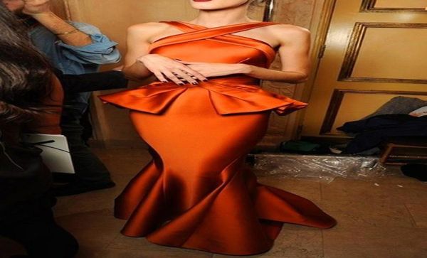 new 201 arabia gold satin myriam haifa celebrity dresses backless mermaid long evening dresses with peplum celebrity gowns 54472844, Black;red
new 201 arabia gold satin myriam haifa celebrity dresses backless mermaid long evening dresses with peplum celebrity gowns 54472844, Black;red