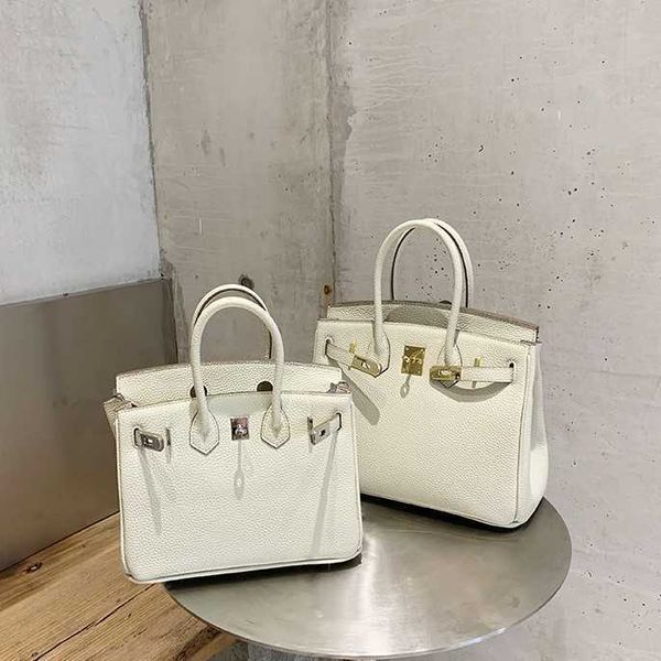 fashion h ermess bags handbag women's 2023 lock buckle bag ins versatile large capacity bag women's one shoulder crossbody bag
fashion h ermess bags handbag women's 2023 lock buckle bag ins versatile large capacity bag women's one shoulder crossbody bag