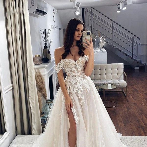 2023 arabic a line wedding dresses off the shouder lace applique boho bridal gowns side split sweep train country bridal gowns overskirts, White
2023 arabic a line wedding dresses off the shouder lace applique boho bridal gowns side split sweep train country bridal gowns overskirts, White