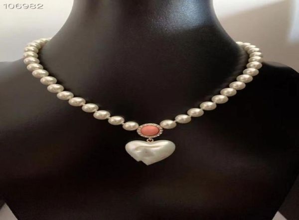 luxury brand logo pendant necklace white heart pearl charm beads chain short for designer women jewelry9710456, Silver
luxury brand logo pendant necklace white heart pearl charm beads chain short for designer women jewelry9710456, Silver