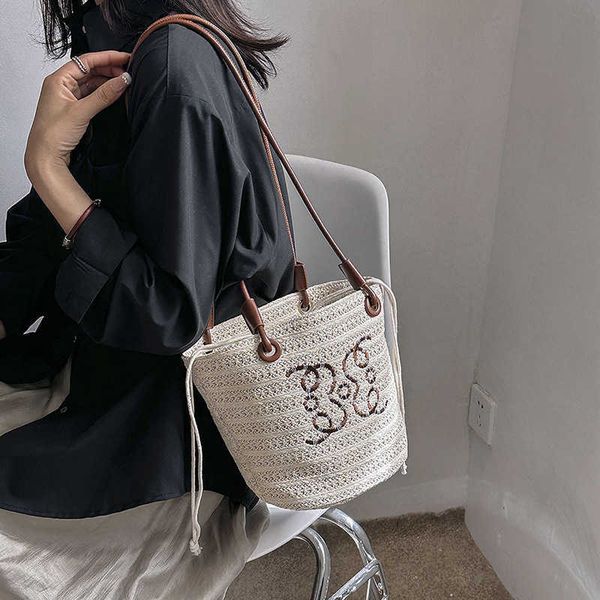 french straw woven bag women s new high capacity portable vegetable basket tote one shoulder beach beach vacation handbag 230529
french straw woven bag women s new high capacity portable vegetable basket tote one shoulder beach beach vacation handbag 230529