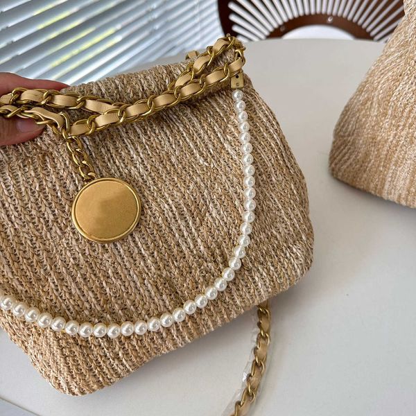 designer summer beach bag fashion woven trash handbag tote limited beach bag metal pearl chain shoulder bag women straw crossbody purse chai
designer summer beach bag fashion woven trash handbag tote limited beach bag metal pearl chain shoulder bag women straw crossbody purse chai