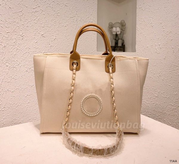 classic deauville tote shopping bag luxury channel handbag womens mens nylon canvas shoulder bag high capacity designer crossbody chain clut
classic deauville tote shopping bag luxury channel handbag womens mens nylon canvas shoulder bag high capacity designer crossbody chain clut