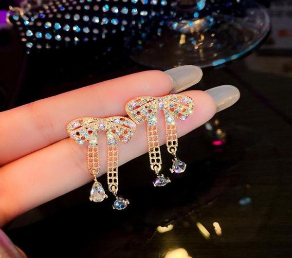 dangle chandelier korean design fashion jewelry exquisite copper inlaid zircon bow tasse danglel earrings elegant female9510881, Silver
dangle chandelier korean design fashion jewelry exquisite copper inlaid zircon bow tasse danglel earrings elegant female9510881, Silver