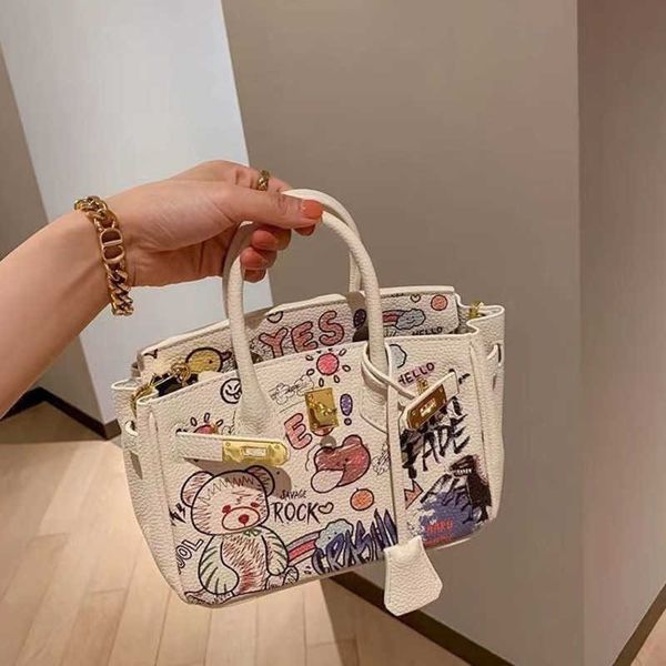 h ermes totes handbags new genuine leather cartoon graffiti crossbody bags shoulder bags portable ins small pack spring/summer versatile wom
h ermes totes handbags new genuine leather cartoon graffiti crossbody bags shoulder bags portable ins small pack spring/summer versatile wom
