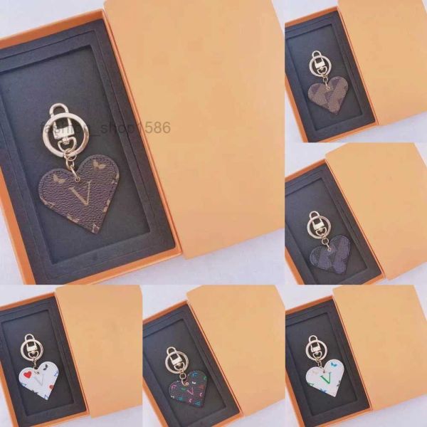 designer brand keychain key chain men luxury heart-shaped car keyring women fashion bee buckle keychains handmade leather bags pendant', Silver
designer brand keychain key chain men luxury heart-shaped car keyring women fashion bee buckle keychains handmade leather bags pendant', Silver