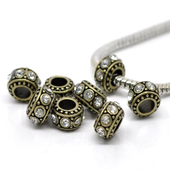 whole10 bronze tone clear rhinestone european spacer beads 11x58mm over 120 express7159132, Silver
whole10 bronze tone clear rhinestone european spacer beads 11x58mm over 120 express7159132, Silver