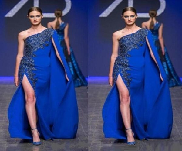 royal blue one shoulder evening gowns 2016 lace applique high split prom dresses cape style floor length formal party dresses1566755, Black;red
royal blue one shoulder evening gowns 2016 lace applique high split prom dresses cape style floor length formal party dresses1566755, Black;red