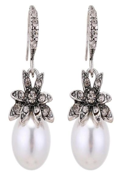 dangle chandelier vintage sun flower imitate pearl crystal earrings women fashion jewelry accessories brincos drop9208119, Silver
dangle chandelier vintage sun flower imitate pearl crystal earrings women fashion jewelry accessories brincos drop9208119, Silver