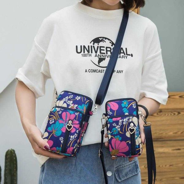 mobile phone bag mini small vertical three layer coin purse female messenger fabric wrist arm halter, Red;black
mobile phone bag mini small vertical three layer coin purse female messenger fabric wrist arm halter, Red;black