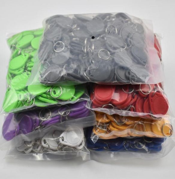 100pcslot t5577 rewritable programmable rfid 125khz keychain keyfobs key finder for copy em4100 cards5654107
100pcslot t5577 rewritable programmable rfid 125khz keychain keyfobs key finder for copy em4100 cards5654107