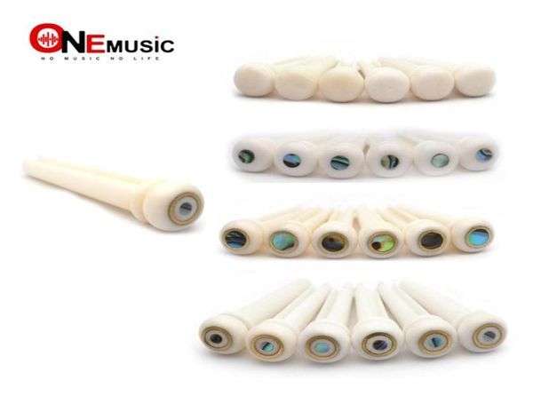 getmusic 60pclot guitar bridge cattle bone pins with brass circle pearl shell dot string nails pin nature color of bone5158769
getmusic 60pclot guitar bridge cattle bone pins with brass circle pearl shell dot string nails pin nature color of bone5158769