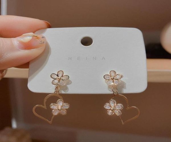 dangle chandelier korean temperament sweet girl women hollow zircon flower love earrings personality fashion female jewelry acce5226405, Silver
dangle chandelier korean temperament sweet girl women hollow zircon flower love earrings personality fashion female jewelry acce5226405, Silver