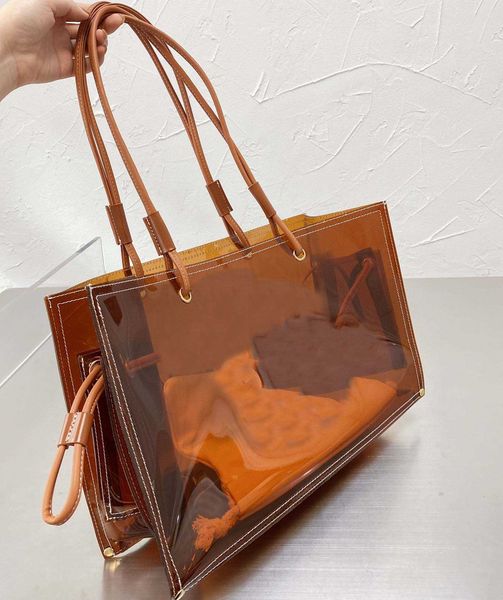 pvc clear jelly designer handbag women tote shopper tote bag slanting large capacity shoulder purse 220712
pvc clear jelly designer handbag women tote shopper tote bag slanting large capacity shoulder purse 220712