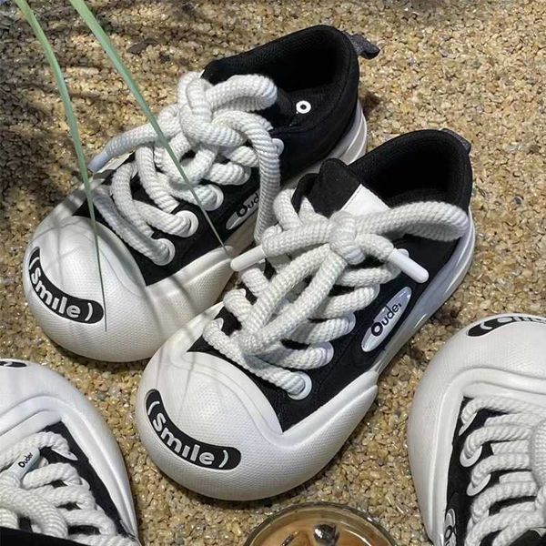 oudee smller black and white large toe board shoes for female xia xiaozhong with a raised thick sole ugly and cute round head and a
oudee smller black and white large toe board shoes for female xia xiaozhong with a raised thick sole ugly and cute round head and a