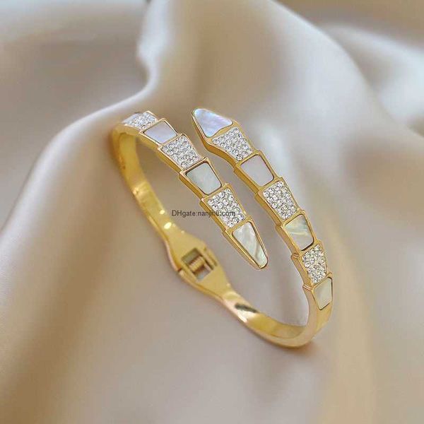 designer luxury belgary brand titanium steel snake white shell 18k rose gold colorless high grade diamond embedding snap open closed bracele, Black
designer luxury belgary brand titanium steel snake white shell 18k rose gold colorless high grade diamond embedding snap open closed bracele, Black