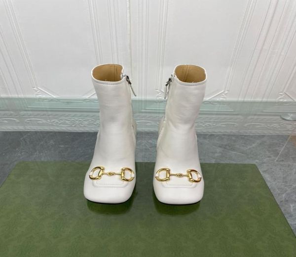 classic fashion metal button women039s boots side zipper design black and white with 75cm high complete packaging6852036
classic fashion metal button women039s boots side zipper design black and white with 75cm high complete packaging6852036