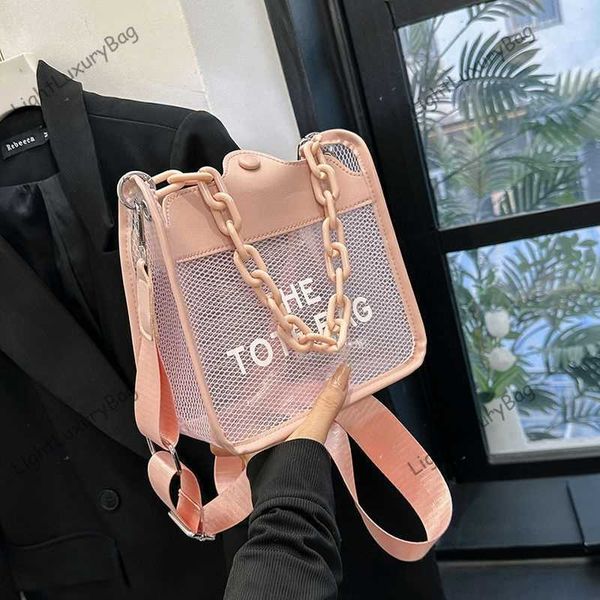 trend pink jelly tote bag designer transparency chain shoulder crossbody bags fashion summer beach bags women luxury brand female purses 230
trend pink jelly tote bag designer transparency chain shoulder crossbody bags fashion summer beach bags women luxury brand female purses 230
