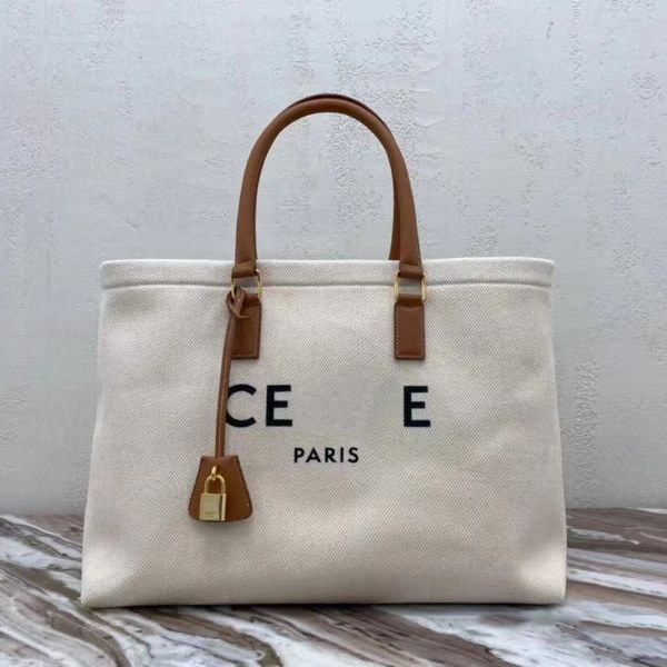 new cabas printed faux leather cowhide handbag triomphe canvas beach bags fashion the tote bag pochette shoulder cross body travel shopping
new cabas printed faux leather cowhide handbag triomphe canvas beach bags fashion the tote bag pochette shoulder cross body travel shopping