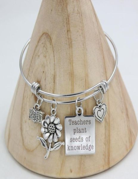 whole new arrival stainless steel wire bangle bracelet heart flower book teachers charm bracelets for teachers gifts3998084, Golden;silver
whole new arrival stainless steel wire bangle bracelet heart flower book teachers charm bracelets for teachers gifts3998084, Golden;silver