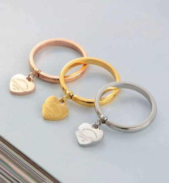 factory whole love letter stainless steel hollow tail ring pendant ring gold silver rose for couple gift5005241
factory whole love letter stainless steel hollow tail ring pendant ring gold silver rose for couple gift5005241