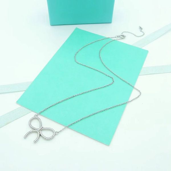 women's designer bow necklace fashion classic pendant girls' valentine's day gift jewelry with box, Silver
women's designer bow necklace fashion classic pendant girls' valentine's day gift jewelry with box, Silver
