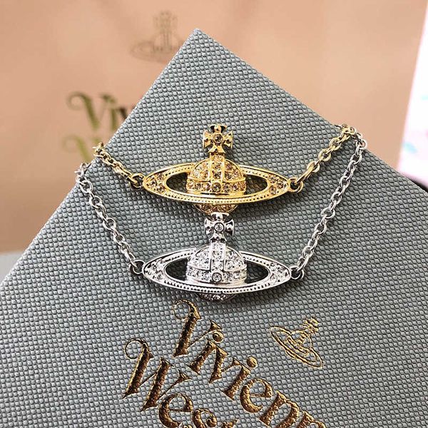 classic vivienne we saturn west empress dowager women's fashion bracelet, White;black
classic vivienne we saturn west empress dowager women's fashion bracelet, White;black