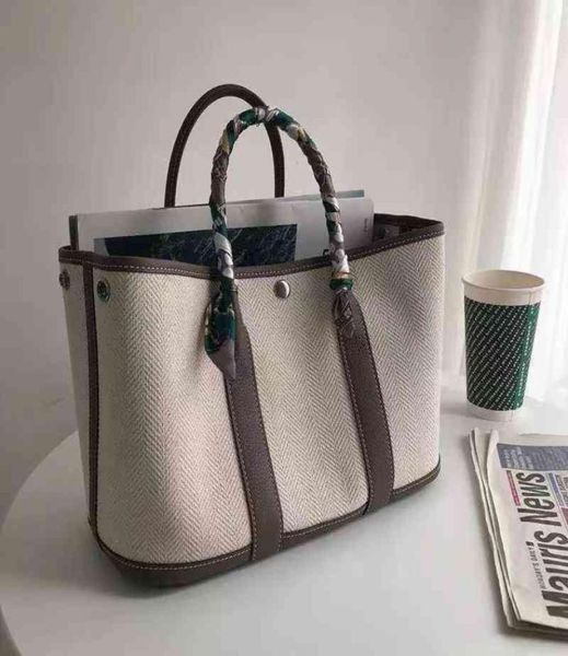large capacity new canvas with cowhide head bag garden party casual hand oneshoulder color slant tote6906835
large capacity new canvas with cowhide head bag garden party casual hand oneshoulder color slant tote6906835