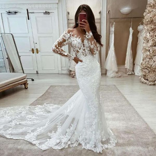 elegant long sleeves mermaid lace boho wedding dresses sheer tulle applique white ivory custom made bridal gowns with covered buttons
elegant long sleeves mermaid lace boho wedding dresses sheer tulle applique white ivory custom made bridal gowns with covered buttons