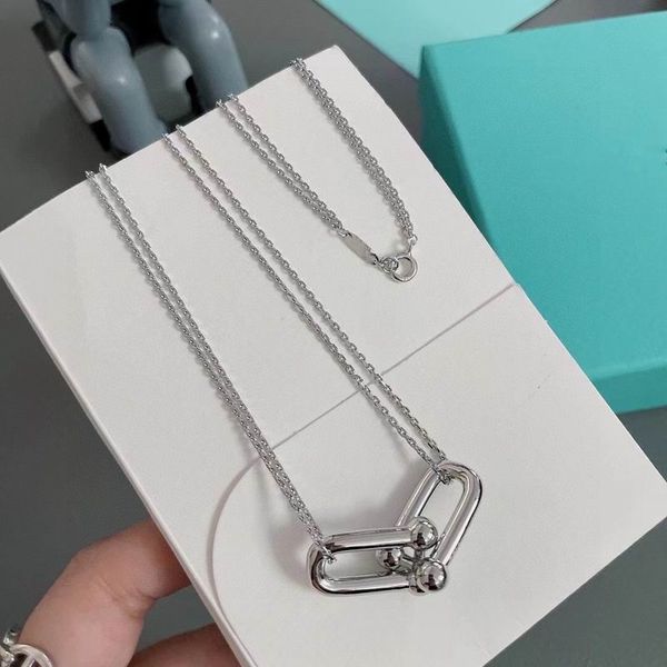 2023 lovely cute pendant necklaces long silver thin stainless steel chain two joint balls rings luxury designer women necklace with blue dus
2023 lovely cute pendant necklaces long silver thin stainless steel chain two joint balls rings luxury designer women necklace with blue dus
