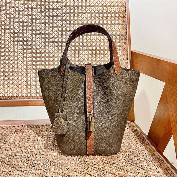 original edition 7a h home designer picotin lock bags vegetable basket colored elephant grey paired with gold brown high grade feel handle l
original edition 7a h home designer picotin lock bags vegetable basket colored elephant grey paired with gold brown high grade feel handle l