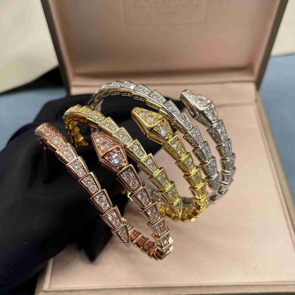 designer luxury belgary brand bone spring 18k rose gold head and tail diamond snake shaped open loop elastic bracelet, Black
designer luxury belgary brand bone spring 18k rose gold head and tail diamond snake shaped open loop elastic bracelet, Black