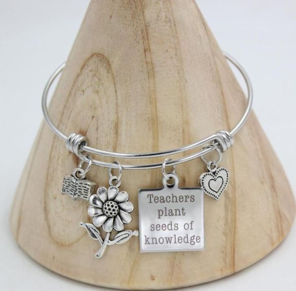 whole new arrival stainless steel wire bangle bracelet heart flower book teachers charm bracelets for teachers gifts7707395, Golden;silver
whole new arrival stainless steel wire bangle bracelet heart flower book teachers charm bracelets for teachers gifts7707395, Golden;silver