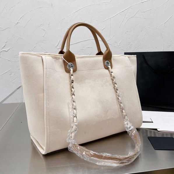 pink tote shoulder bag channel handle designer bag cc canvas pearl large beach handbag totes with chain strap shopping wallet purses designe
pink tote shoulder bag channel handle designer bag cc canvas pearl large beach handbag totes with chain strap shopping wallet purses designe