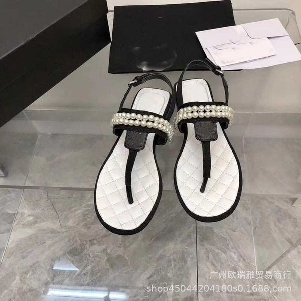 23 summer new high edition small fragrant wind clamping foot flat bottom t-shaped pearl chain straight buckle sandals for women, Black
23 summer new high edition small fragrant wind clamping foot flat bottom t-shaped pearl chain straight buckle sandals for women, Black