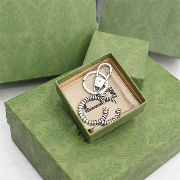 latest key designer key buckle fashion letter g keychain luxury men women car key chain, Silver
latest key designer key buckle fashion letter g keychain luxury men women car key chain, Silver