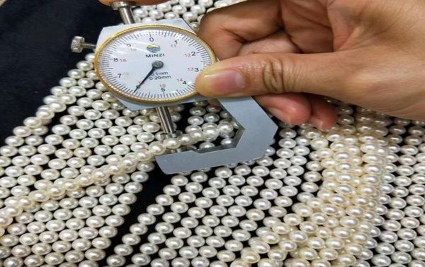 potato round natural pearl 67mm real loose ring pearl strands for whole8393256, White
potato round natural pearl 67mm real loose ring pearl strands for whole8393256, White