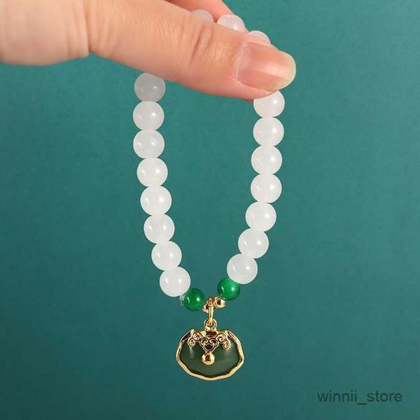 charm bracelets classic white stone beaded lock pendant color bracelet for women chinese ethnic style bracelet jewelry r230701, Golden;silver
charm bracelets classic white stone beaded lock pendant color bracelet for women chinese ethnic style bracelet jewelry r230701, Golden;silver