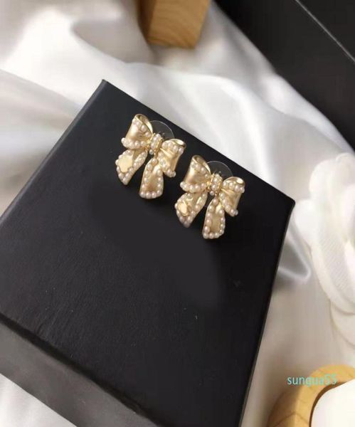 fashion knot pearl bow earrings ladies 925 silver needles simple allmatch jewelry8516102
fashion knot pearl bow earrings ladies 925 silver needles simple allmatch jewelry8516102
