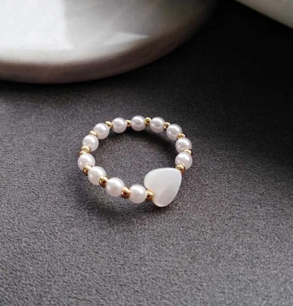 korean fashion elastic rope pearl beads ring elegant simple female heartshaped gold ring charming women party jewelry girl gift q3185010, Silver
korean fashion elastic rope pearl beads ring elegant simple female heartshaped gold ring charming women party jewelry girl gift q3185010, Silver